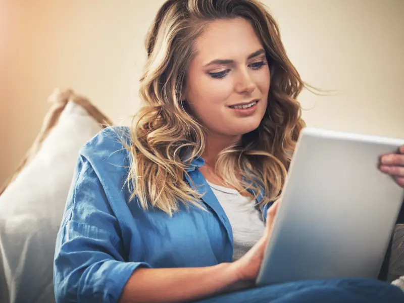 Person using a tablet to explore AI search results and answer engine content image on chad ruiz marketing expert in Louisiana blog